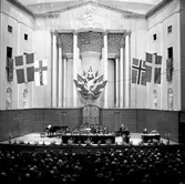 Mötets öppnande i Konserthusets stora sal.
