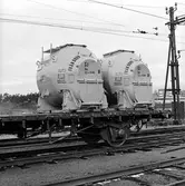 Statens Järnvägar, SJ Lbms. (fd Lbs). Vagn med Em-behållare vid Älvsjö station