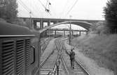 Statens Järnvägar SJ T21 107 diesellok. Skanstull.
Skanstullbroarna i bakgrunden. Fotot taget mot Skanstull.