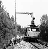 Elektrifieringsarbete på linjen mellan Rättvik och Mora, stolpresning.