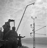 Elektrifiering av linjen Ånge-Sundsvall. Monteringsarbeten. Utdragning av småkraftledning.