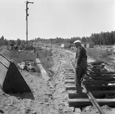 Banbyggnad. Dubbelspårsbygge på sträckan Boxholm-Sommen.