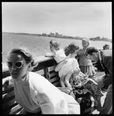 Resande på fartygets däck.