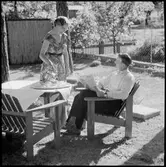 Fika i trädgården. Trafikaktiebolaget Grängesberg-Oxelösund Järnvägar.