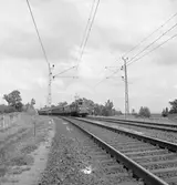 Statens Järnvägar SJ F 626 med persontåg.