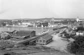 Vy över Södra hamnen med bland annat Stadshotellet och järnvägsstationen. Stationen öppnades för trafik 1903.