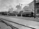 Statens Järnvägar, SJ S 1056 och  SJ Tb 885 med tåg på Skövde station.