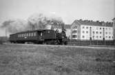 Stockholm - Roslagen Järnväg, SRJ lok 11 ”Schebo” Skrotad 1939. Med tåg på väg Uppsala - Gimo