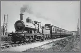 Ånglok nummer 354 med personvagn.