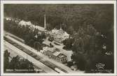 Flygfoto över järnvägsstation och turisthotellen i Rättvik.