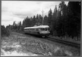 Perontåg på linjen mellan Vasselhyttan och Rällså. Tfv Grängesberg - Oxelösunds Järnvägar, TGOJ Y0a 104.