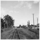 Del av bangården vid Axvall station. Stationen öppnades 1874 med en- och en halv vånings stationshus i trä. Den upphörde 1961.