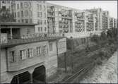 Stockholm Södra station, byggd 1926. Bangård och hyreshus i bakgrunden.