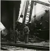 Urspårning av lok och kranarbete med ångkran 