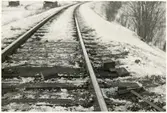 Banarbete efter urspårning av tåg 93, Nordpilen, på sträckan mellan Simeå och Undersvik 1956-03-27.