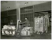 Trucktransport med pallastgods i Cö-behållare.