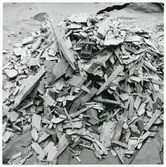 Vedflis för gengasdrift. Tändsticksask som storleksjämförelse.