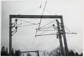 Kontaktledningar på bron vid Stäket, på sträckan mellan Stäket och Kungsängen.
