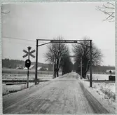 Järnvägsövergång vid Vrams Gunnarstorp på linjen mellan Åstorp och Norra Vram.