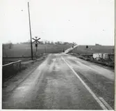 Järnvägsövergång vid Sånna, på sträckan mellan Östra Ljungby och Kärreberga.