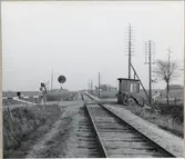 Järnvägsövergång med vaktkur vid Hundsäng på linjen mellan Skarhult och Hurva.