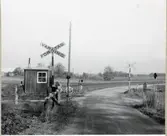 Järnvägsövergång med vaktkur vid Orås på linjen mellan Askeröd och Bjärsjölagård.