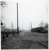 Järnvägsövergång vid Vinnö, på sträckan mellan Färlöv och Karpalund.