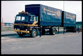 Scania lastbil märkt ASG transport-spedition.