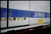 Jumbo-container med oreglade dörrar.