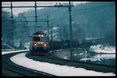 Ellok med godsvagnar. Statens Järnvägar, SJ Rc 1141, tillverkat 1975 av ASEA.