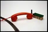 Telefonlur vid modellspår.