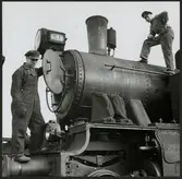 Tömning av aska från Trafikaktiebolaget Grängesberg - Oxelösunds Järnvägar, TGOJ S3 51.