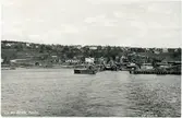 Vy med Alviks färjeläge, Alnö. Vykort.