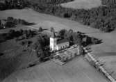 Flygfoto över Källeryd kyrka i Nissafors, Jönköpings län. Nr R 1791