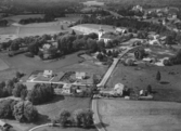 Flygfoto över Forsheda i Värnamo kommun, Jönköpings län. Nr 225/1956