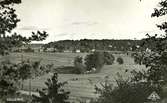 Vykort, 1940-tal.
Utsikt från Ramnåsen mot centrum och kyrkbacken.