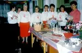 Kommunalhuset ca. 1985-1990.
Röda korset bazar, funktionärer.
Fr.v.:
Inga Brandin
Ulla Lundberg
Birgitta Jacobson
Ingegerd Forsberg Wernberg
Hanni Werner
Gunnel Tavson
Ann-Marie Stomvall
Majken Westberg