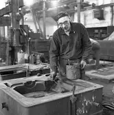 Arbetare på gjuteriet på AMV