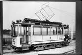 Aktiebolaget Stockholms Spårvägar, SS A1 11, linje 15, som gick mellan Sundbyberg och Haga. På skylten i fram står det att vagnen gick som extratåg. Fotograferad vid Hagalund järnvägsstation.