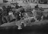 Flygfoto över Tenhult i Jönköpings kommun.  Nr: 1191/1957