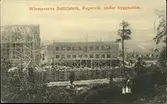 Vykort med motiv över Vivstavarvs Sulfitfabrik i Fagervik under uppbyggnad.
