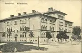 Vykort med motiv över Folkskolan i Sundsvall.