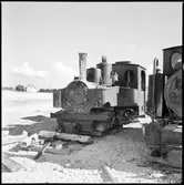 Ånglok 1468 vid Ar kalkbrott. Tillverkades av Henschel & Sohn 1917 med tillverkningsnummer HS 15200 för tyska armén för användning i fält. 1919 kom den till Sverige och 1943 till Gotland och Ahrs Kalkbruk.