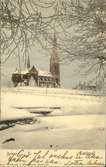 Vykort med vintermotiv över Gustav Adolfs kyrka.