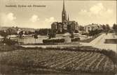 Vykort med motiv över den Bünsowska tjärnen, Gustav Adolfs kyrka och Flickskolan.