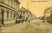 Vykort med motiv över Västra Storgatan i Sundsvall.