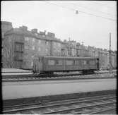 Träbeklädd personvagn.