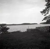 Hamnen med timmerstaplar vid Dagsbo gård.