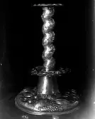 LJUSSTAKE AV MÄSSING.