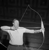 Bågskytte på Idrottshuset.
16 februari 1959.